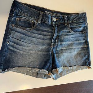 Stylish American Eagle Super Stretch Jean Shorts (Size 12) - Medium Wash Denim